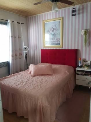 Casa com Edícula no Centro de Penha – Conforto e Exclusividade a 800m da Praia