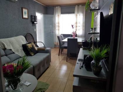 Casa com Edícula no Centro de Penha – Conforto e Exclusividade a 800m da Praia