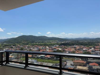 Apartamento com Vista para o Mar e Área de Lazer Completa
