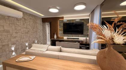 Apartamento alto padrão com terraço privativo e vista para o mar