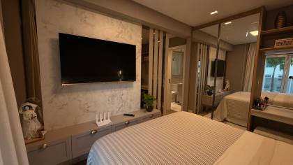 Apartamento alto padrão com terraço privativo e vista para o mar