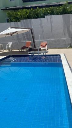 Casa de Condomínio Para Vender com 4 quartos 3 suítes no bairro Estrada do Côco em Camaçari