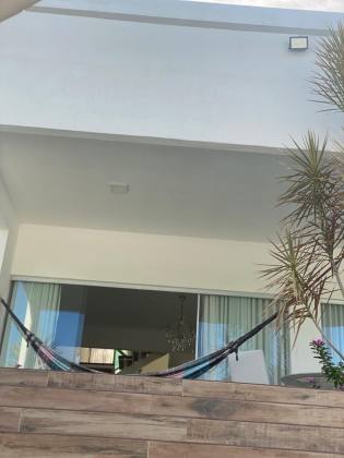 Casa de Condomínio Para Vender com 4 quartos 3 suítes no bairro Estrada do Côco em Camaçari