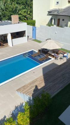 Casa de Condomínio Para Vender com 4 quartos 3 suítes no bairro Estrada do Côco em Camaçari