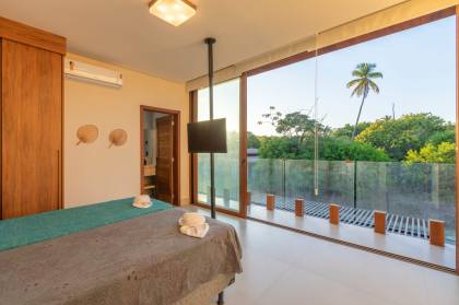 Casa de Condomínio Para Vender com 5 quartos 5 suítes no bairro Praia do Forte em Mata De São João