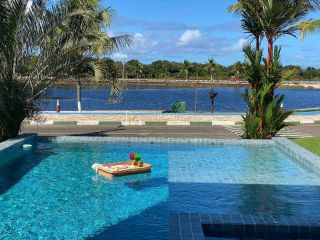 Casa de Condomínio 5/4 e 4 suítes Guarajuba