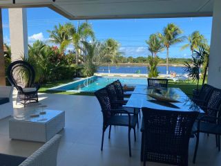 Casa de Condomínio 5/4 e 4 suítes Guarajuba