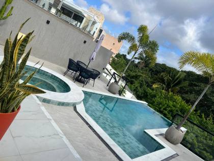 Casa de Condomínio Para Vender com 4 quartos 4 suítes no bairro Alphaville II em Salvador