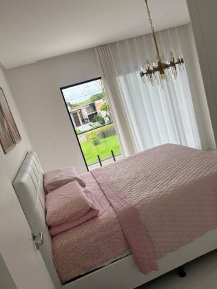 Casa de Condomínio Para Vender com 4 quartos 4 suítes no bairro Alphaville II em Salvador