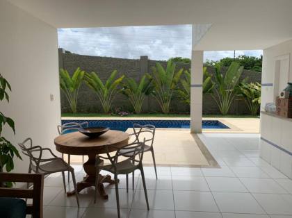 Casa de Condomínio Para Alugar com 4 quartos 4 suítes no bairro Alphaville II em Salvador