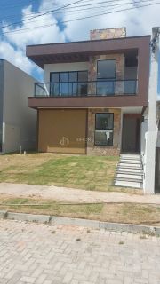 Casa em Condomínio 4 suítes