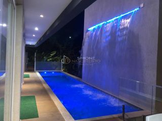 Casa à venda em Alphaville ll com 5 suítes e 8 vagas.