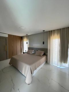 Casa à venda em Alphaville ll com 5 suítes e 8 vagas.