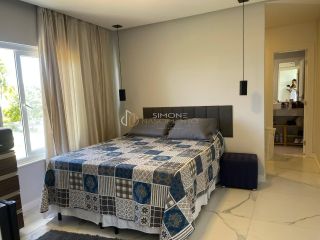 Casa à venda em Alphaville ll com 5 suítes e 8 vagas.