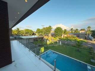 Casa em Condomínio  6 suítes  Guarajuba