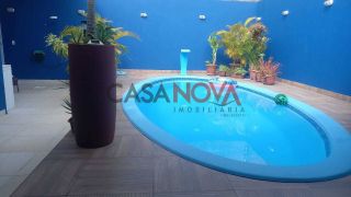 Casa com piscina na Aruana em boa localização