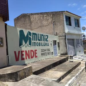 VENDE-SE TERRENO COM 2 CASAS