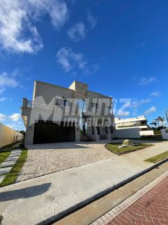 VENDE-SE EXUBERANTE MANSÃO PÉ-NA-AREIA NO COND. DAMHA